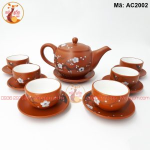 Ấm chén gốm mộc vẽ đào mã AC2002