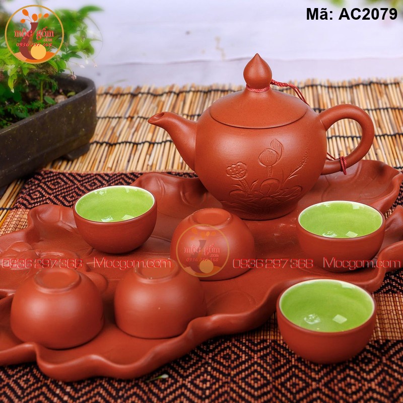 Ấm chén gốm sứ men mộc dáng chóp đào khay lá Sen mã AC2079
